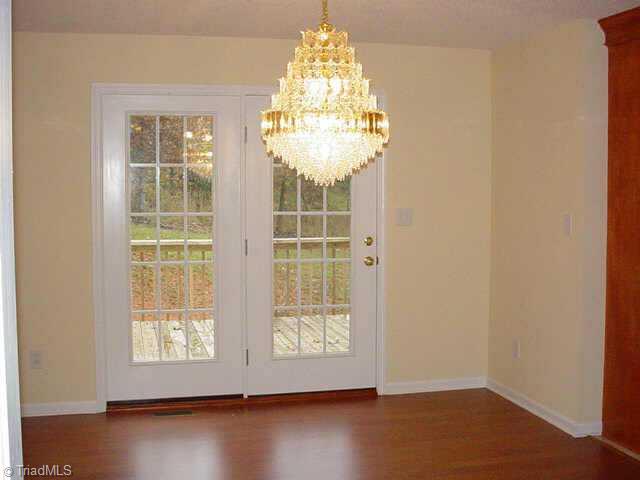 914 Corner Road Pinnacle, NC 27043 - Photo 2 of 6 Other. Roomy dining room looking onto the deck.