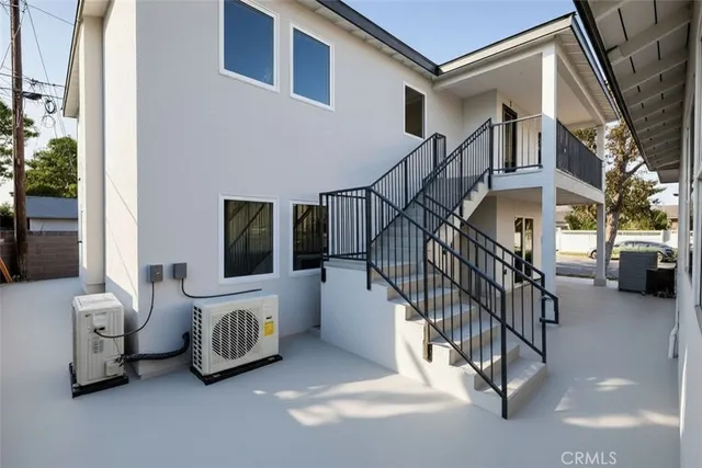 a view of living room with furniture and a flat screen tv