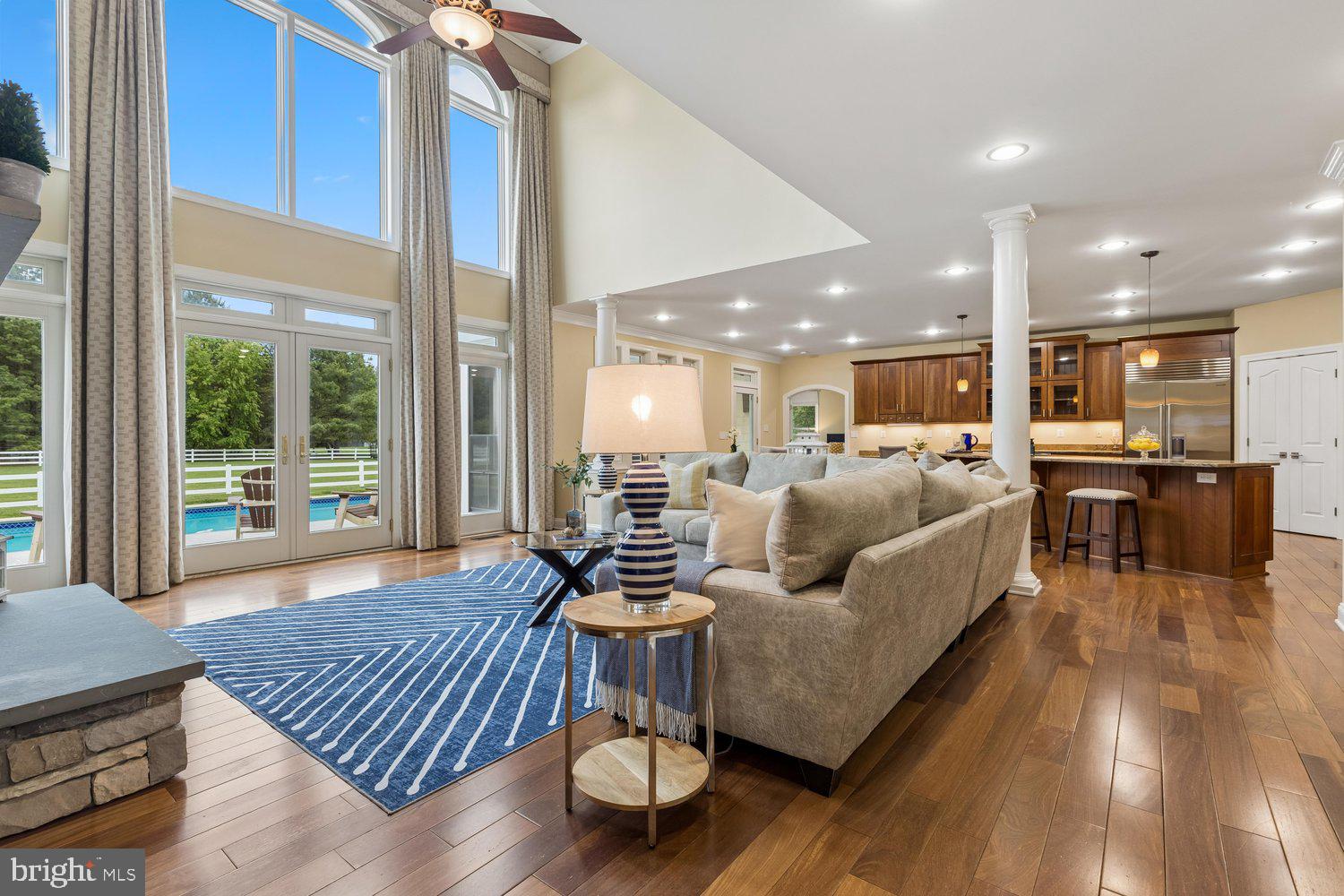 313 Wye Road Queenstown, MD 21658 - Photo 38 of 132 Bright and airy living space with pool view.