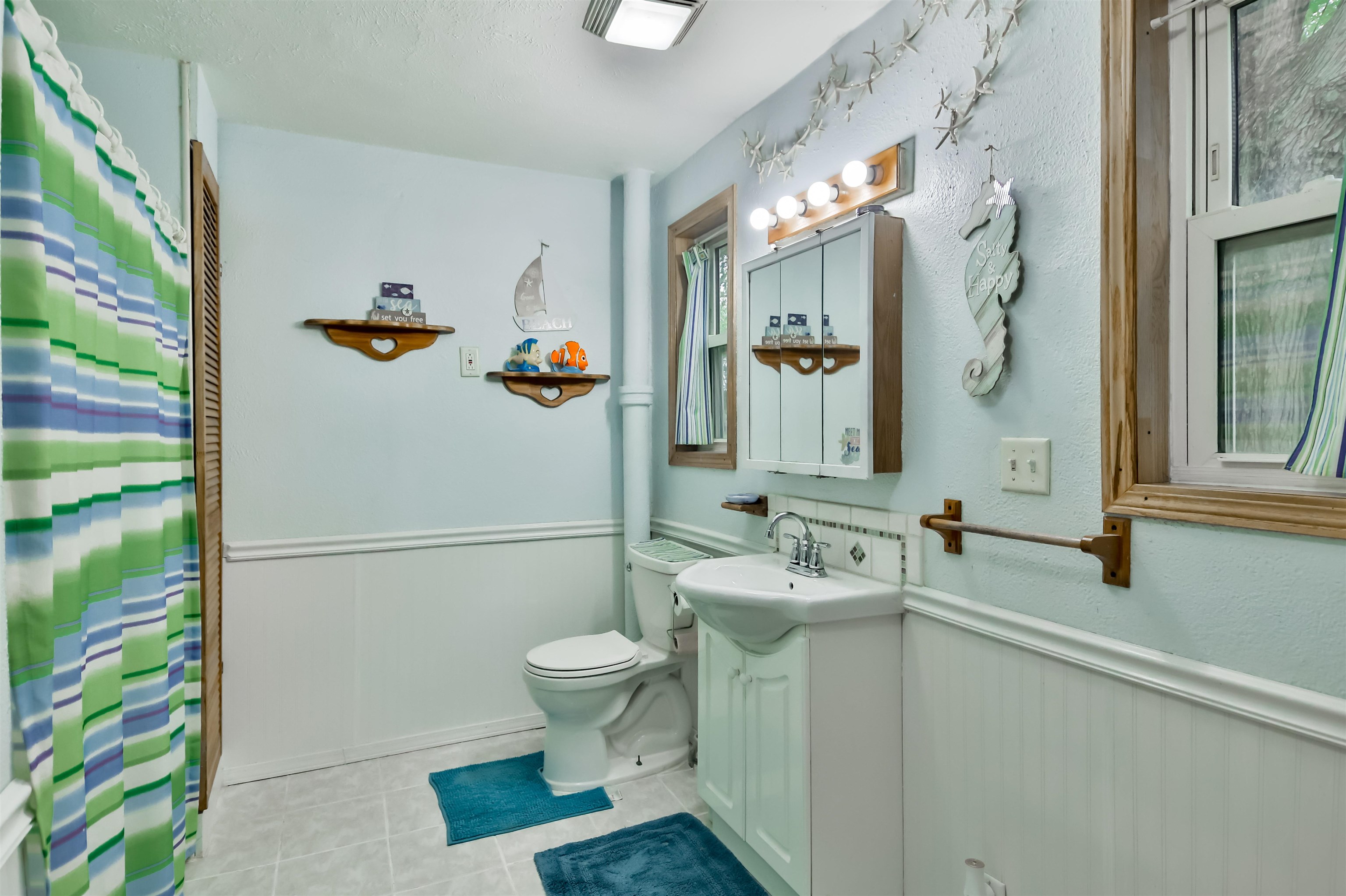 7719 West Coffman Road German Valley, IL 61039 - Photo 20 of 38 a bathroom with a sink a toilet and a shower