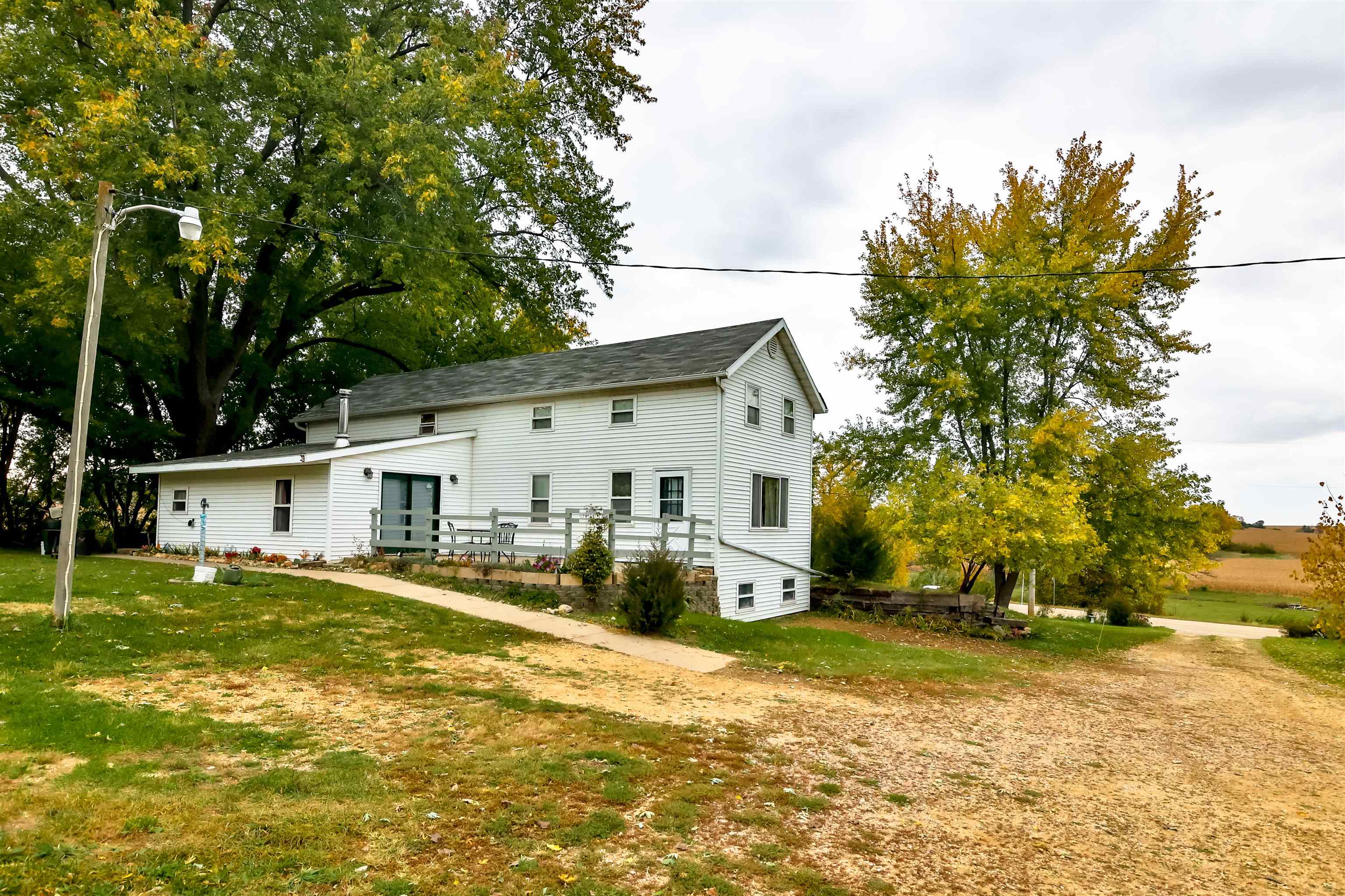 7719 West Coffman Road German Valley, IL 61039 - Photo 10 of 38 a view of a house with backyard and tree