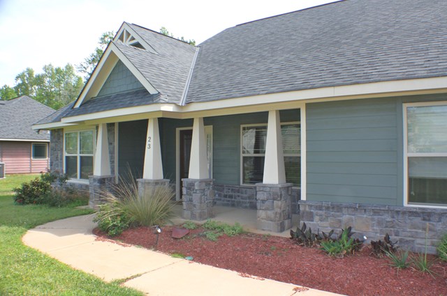 23 Isbell Road Fort Mitchell, AL 36856 - Photo 2 of 37 a front view of a house with garden