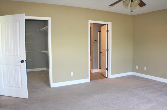23 Isbell Road Fort Mitchell, AL 36856 - Photo 22 of 37 an empty room with closet and a chandelier fan