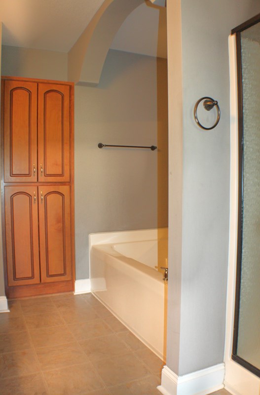 23 Isbell Road Fort Mitchell, AL 36856 - Photo 26 of 37 a bathroom with a bathtub and shower