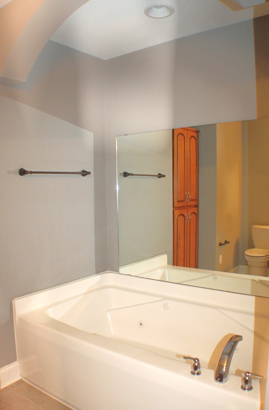 23 Isbell Road Fort Mitchell, AL 36856 - Photo 27 of 37 a bathroom with a bathtub and shower