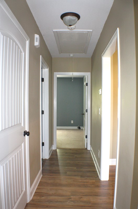 23 Isbell Road Fort Mitchell, AL 36856 - Photo 30 of 37 a view of a hallway with wooden floor and closet area