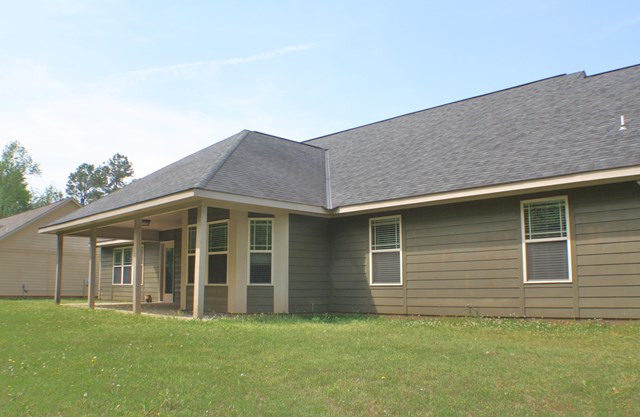 23 Isbell Road Fort Mitchell, AL 36856 - Photo 37 of 37 a front view of a house with a garden