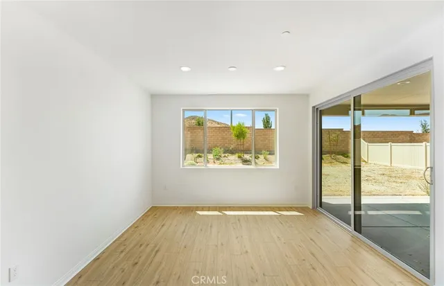 a view of an empty room and window