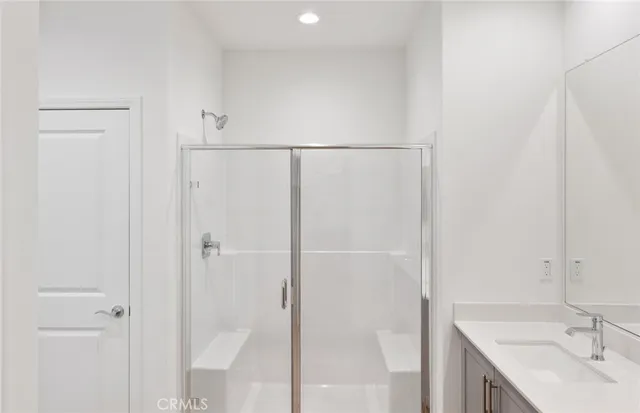 a bathroom with a sink and a shower