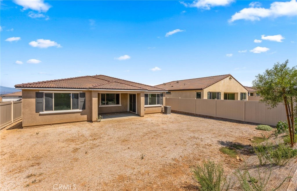 26615 Silver Ore Road Menifee, CA 92570 - Photo 30 of 30 a house with trees in front of it