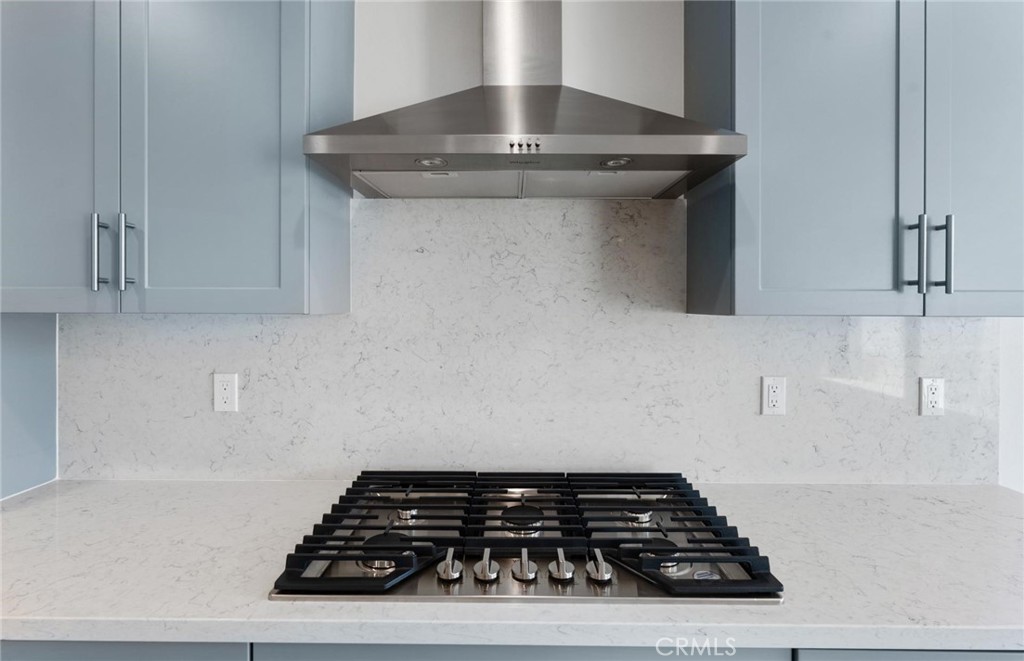 26615 Silver Ore Road Menifee, CA 92570 - Photo 9 of 30 a stove top oven sitting inside of a kitchen