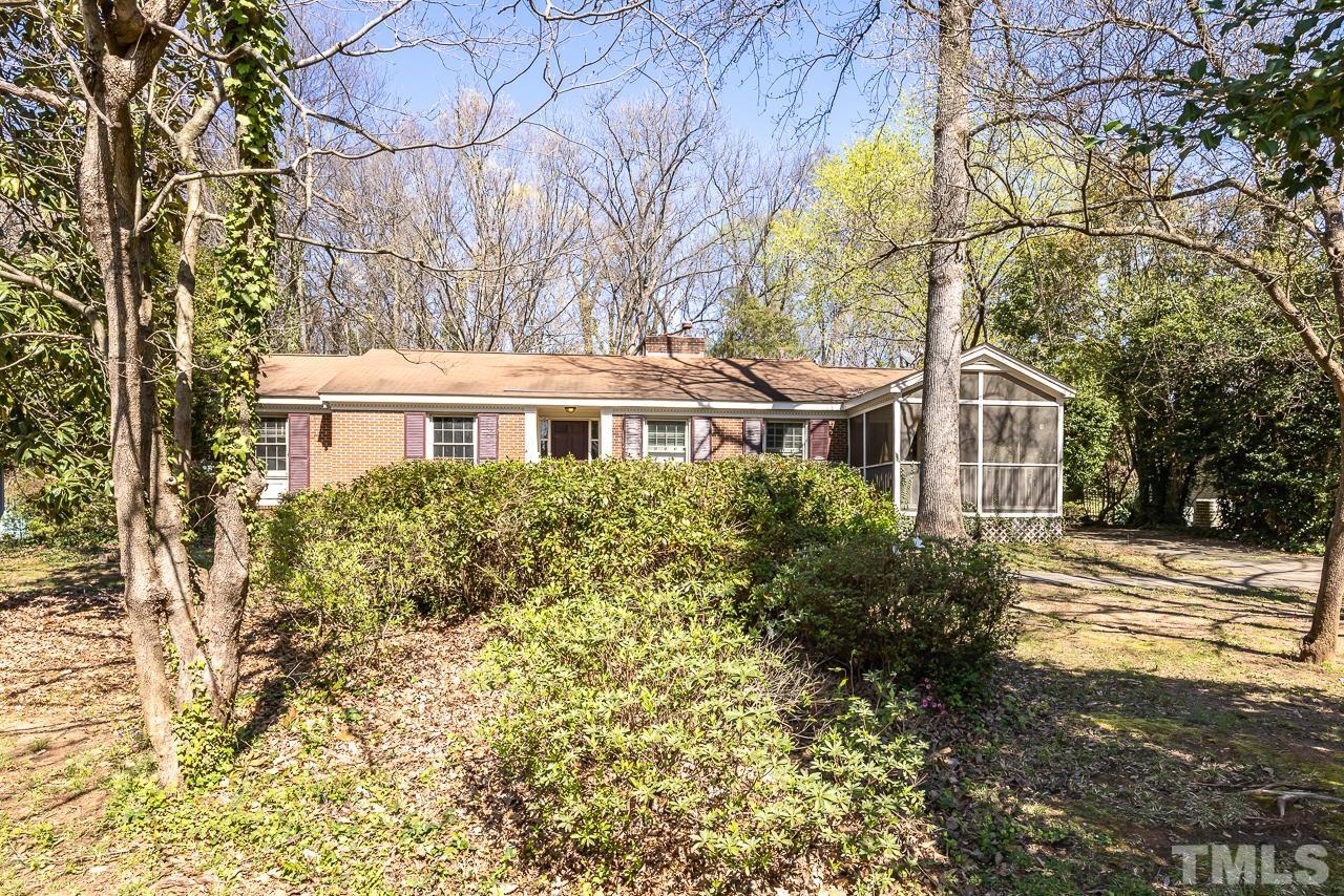 3215 Plantation Road Raleigh, NC 27609 - Photo 27 of 28 front view of a house with a yard