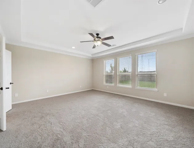 a kitchen with kitchen island granite countertop wooden cabinets and a counter top space