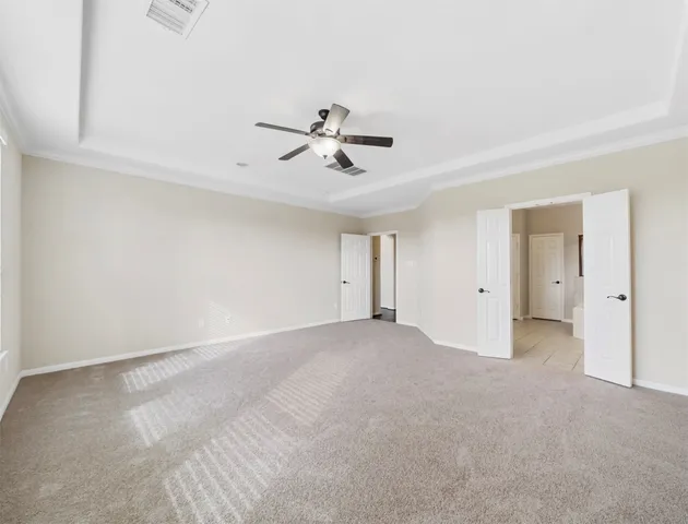 a view of a dining room with furniture and window