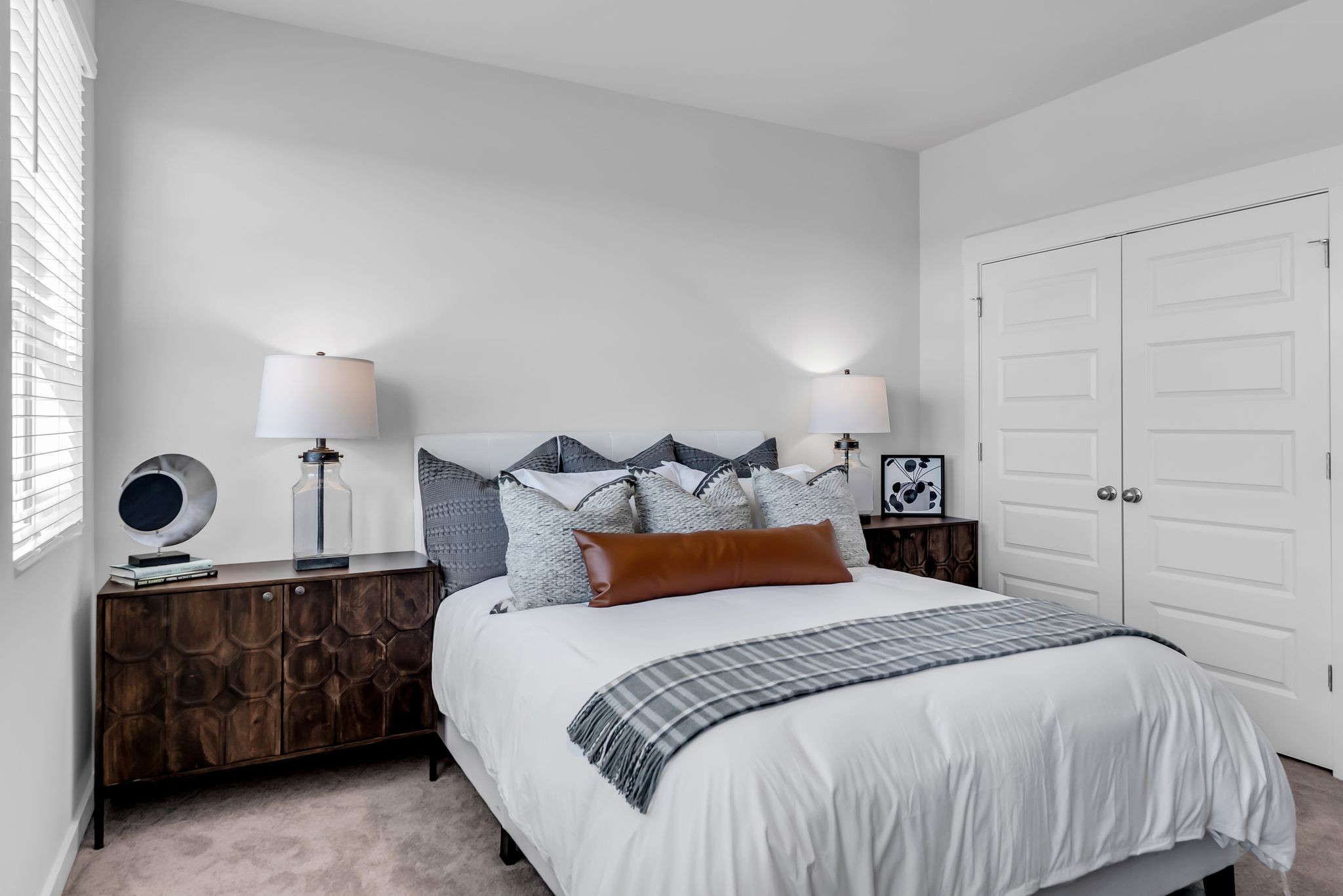 516 Hinton Street Lebanon, TN 37090 - Photo 21 of 24 a bedroom with a bed and a lamp on dresser