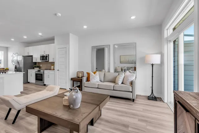 a living room with furniture and a table