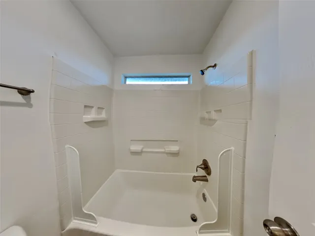 a bathroom with a bathtub