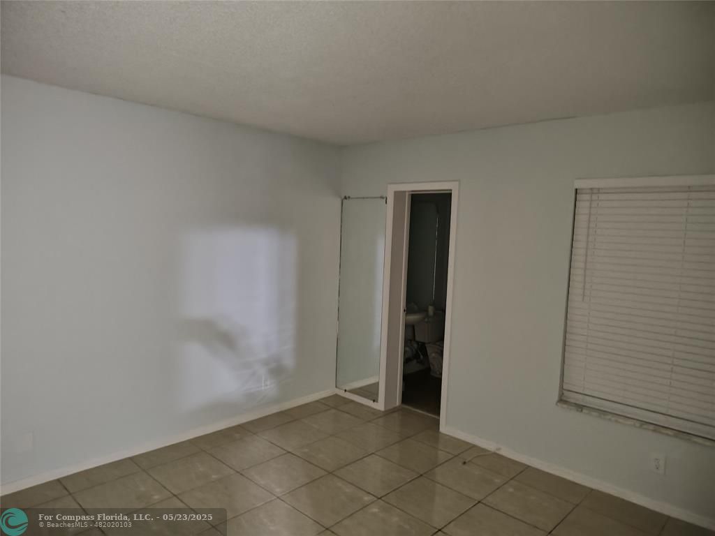 3777 Northwest 78th Avenue, Unit 1B Hollywood, FL 33024 - Photo 2 of 3 a view of an empty room