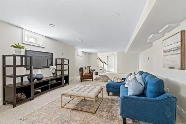 a living room with furniture and a couch