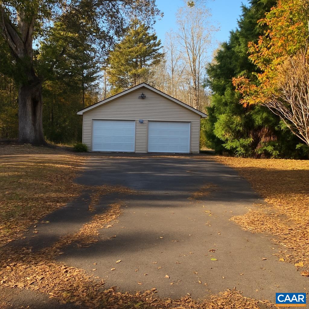 659 Sports Lake Road New Canton, VA 23123 - Photo 4 of 5 a view of backyard of house