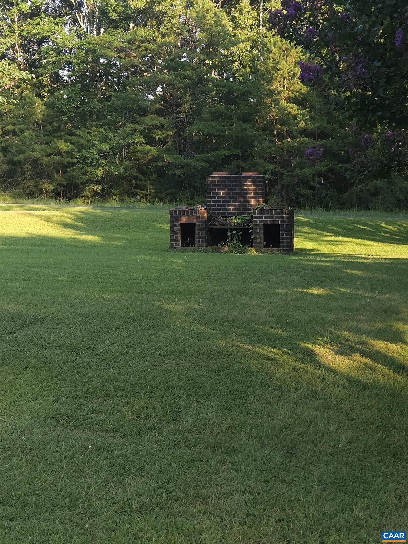 659 Sports Lake Road New Canton, VA 23123 - Photo 5 of 5 a view of a swimming pool with a yard