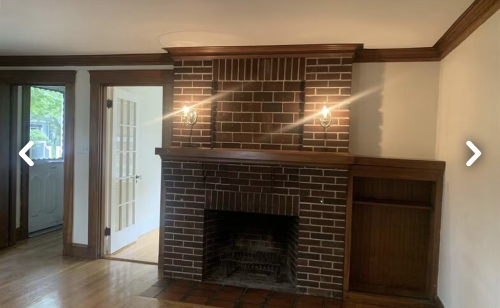 55 Elgin Street, Unit 55 Newton, MA 02459 - Photo 2 of 8 a view of wooden door