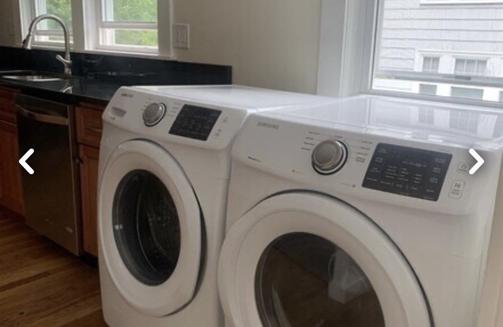55 Elgin Street, Unit 55 Newton, MA 02459 - Photo 6 of 8 a utility room with dryer and washer
