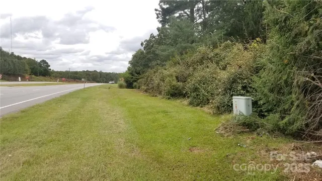a view of a field with an outdoor space