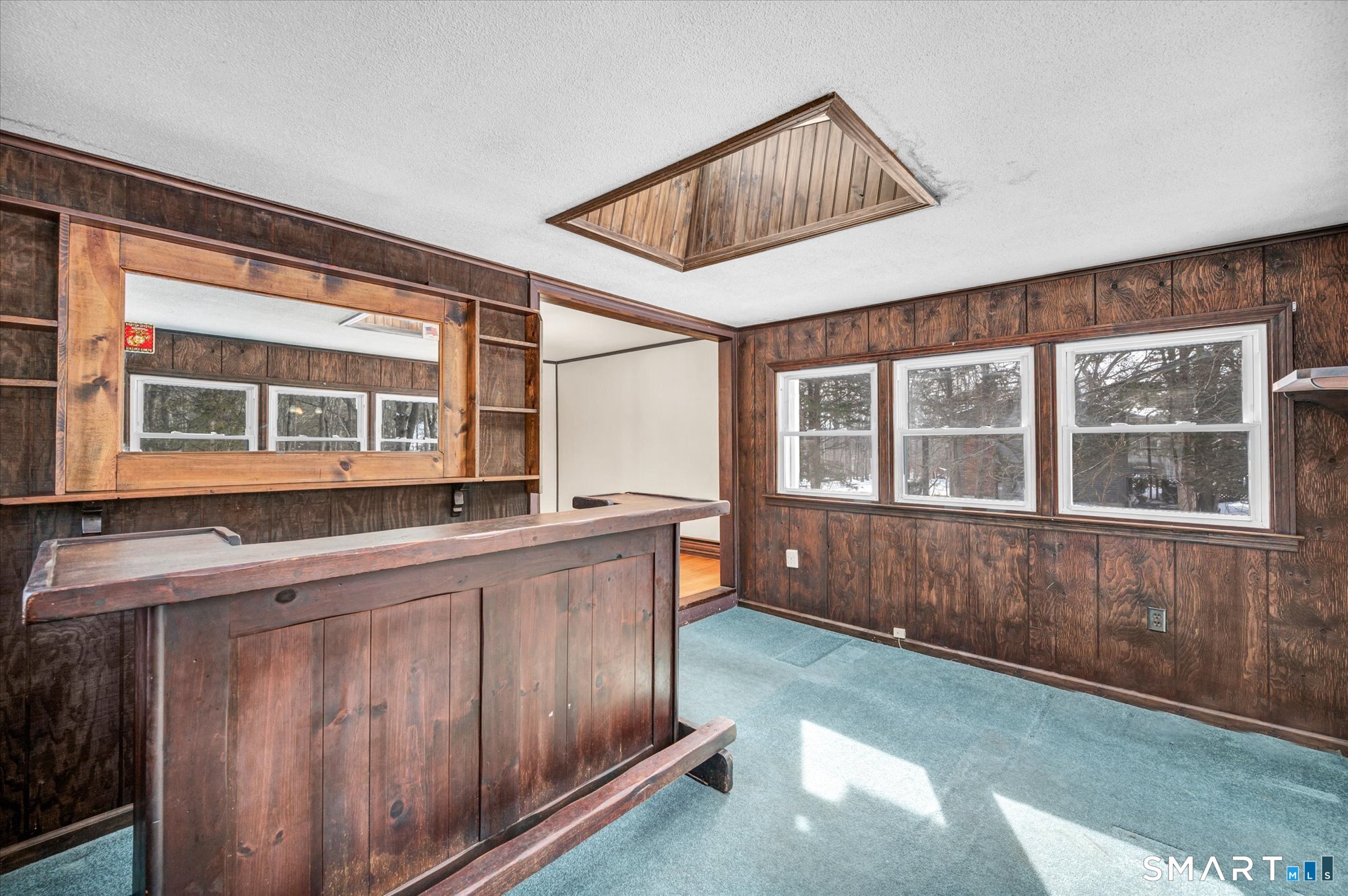 147 Tuttle Road Durham, CT 06422 - Photo 18 of 38 a kitchen with wooden cabinets and a window