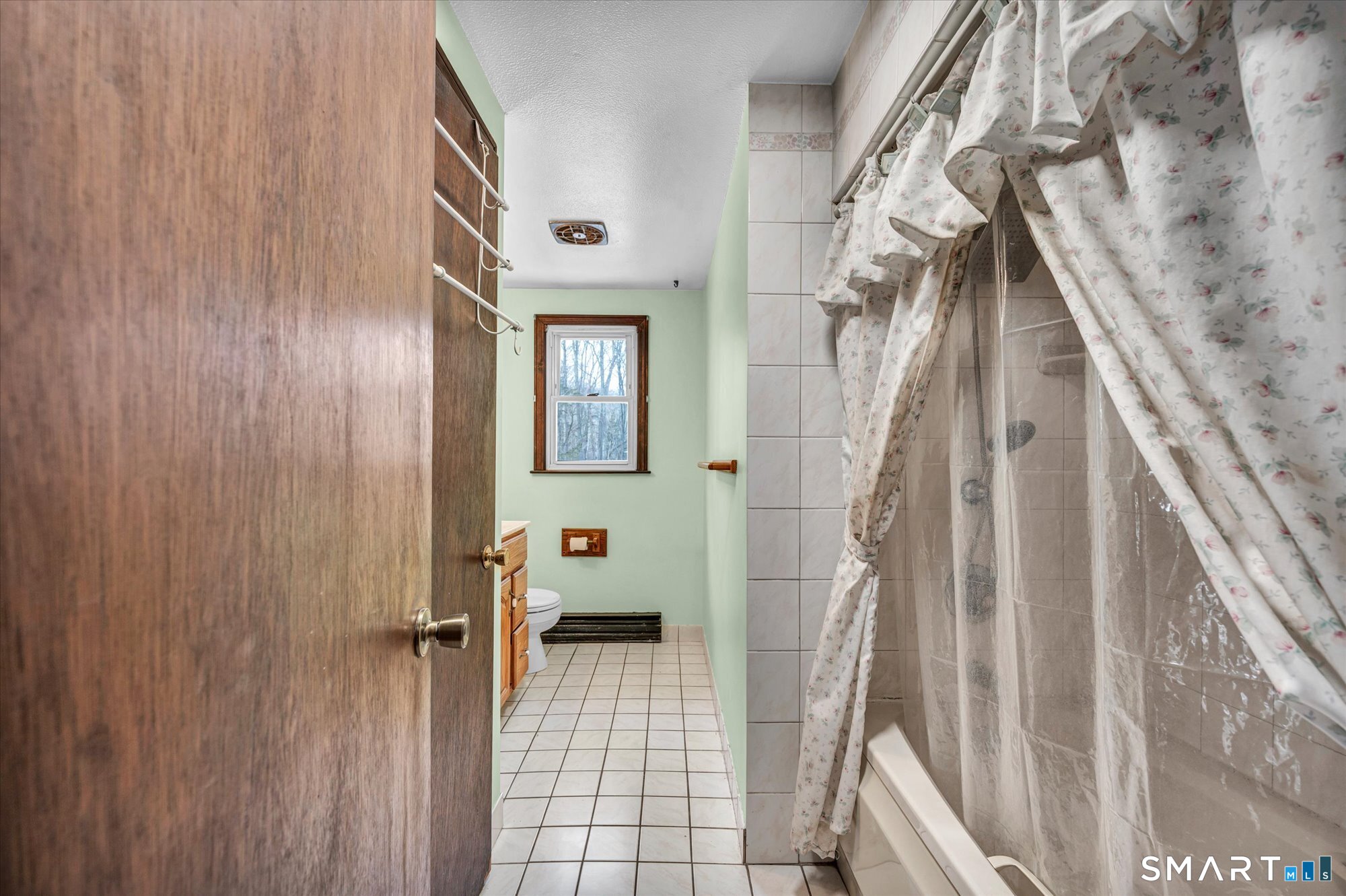 147 Tuttle Road Durham, CT 06422 - Photo 19 of 38 a view of an entryway with wooden floor and stairs