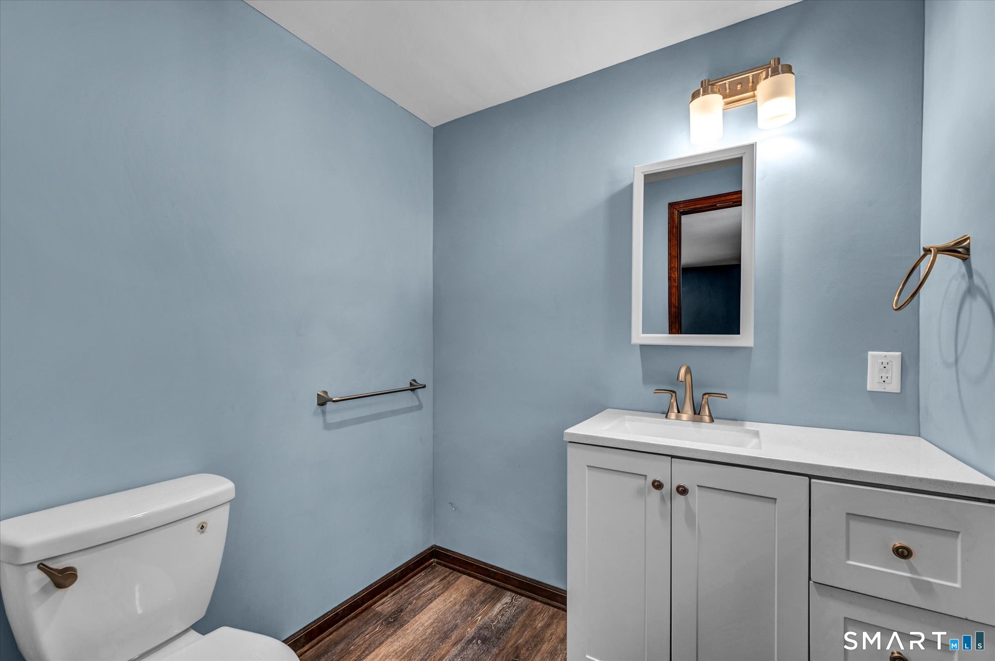 147 Tuttle Road Durham, CT 06422 - Photo 22 of 38 a bathroom with a toilet sink and mirror