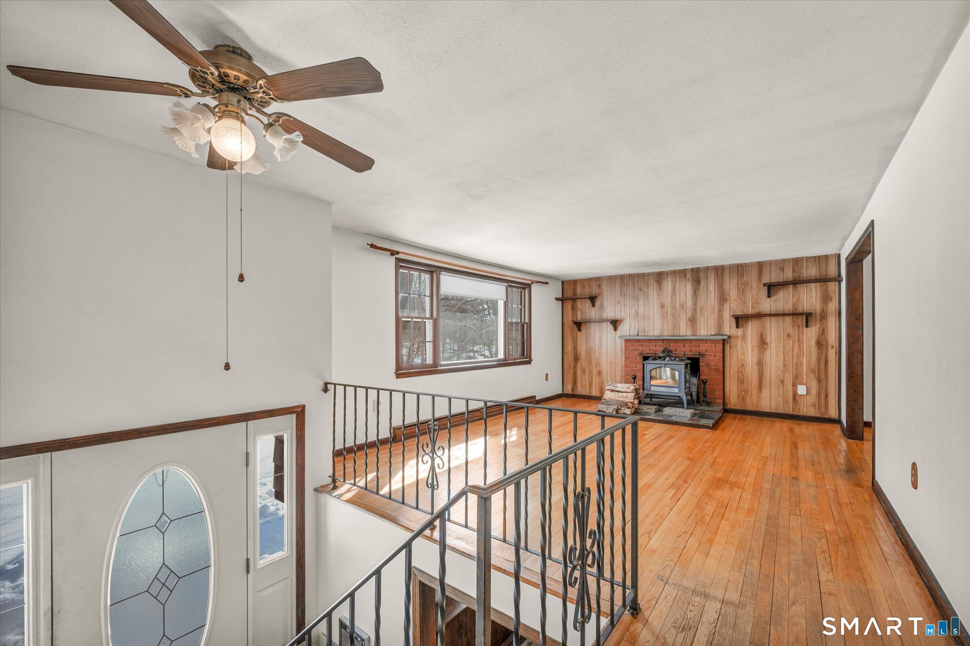 147 Tuttle Road Durham, CT 06422 - Photo 30 of 38 a view of a livingroom with furniture and hardwood floor