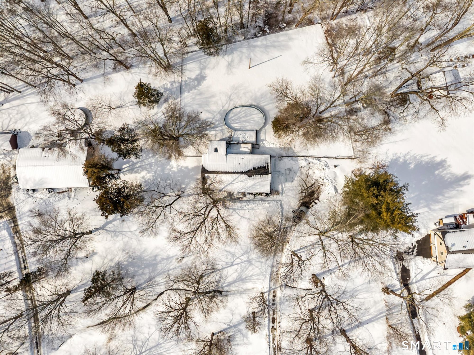 147 Tuttle Road Durham, CT 06422 - Photo 4 of 38 a backyard of a house with table and chairs