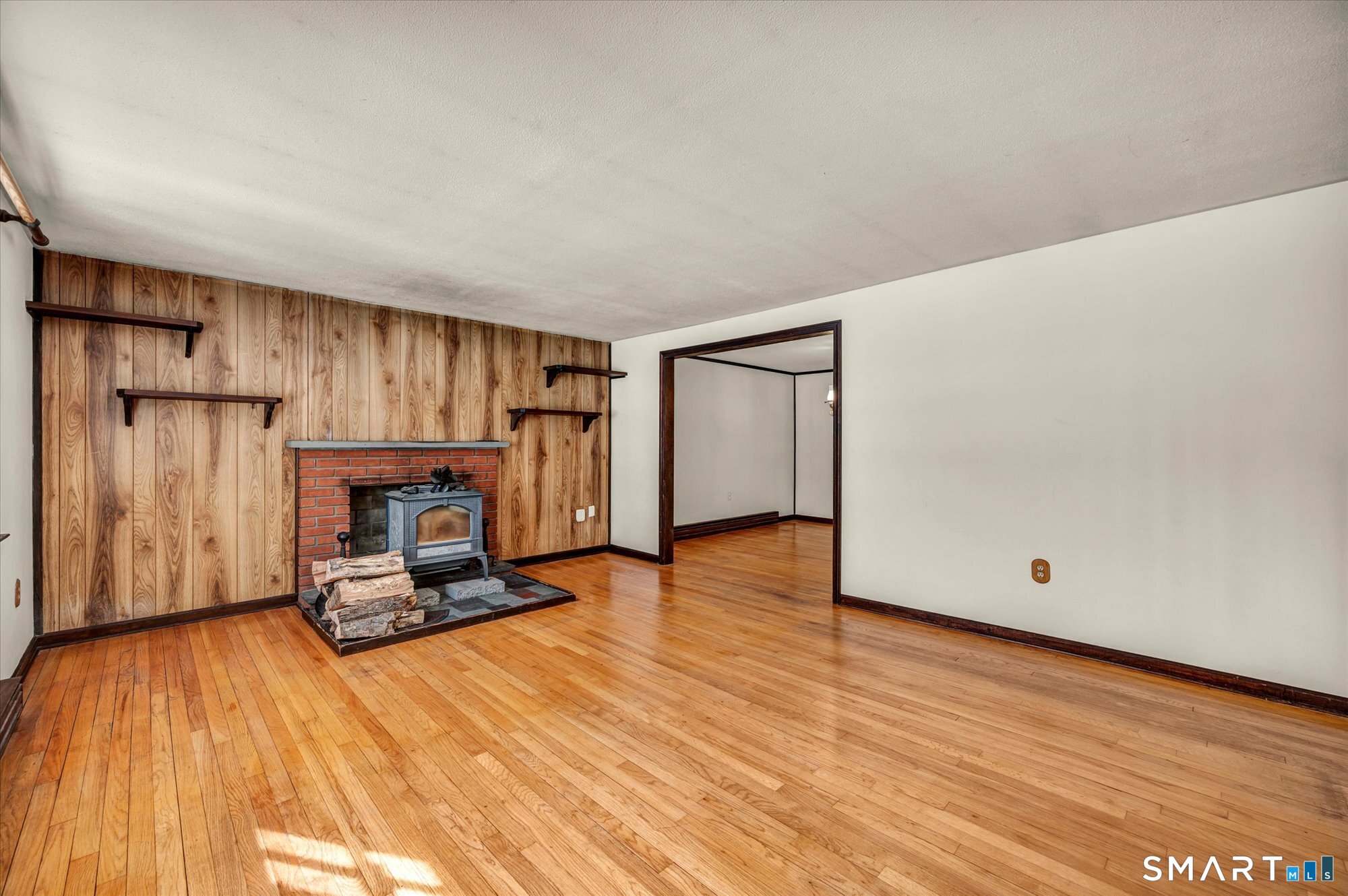 147 Tuttle Road Durham, CT 06422 - Photo 8 of 38 a living room with furniture and a wooden floor