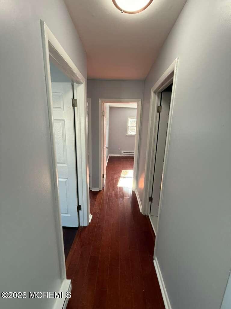 38 Noble Road Sicklerville, NJ 08081 - Photo 3 of 6 a view of a hallway with wooden floor