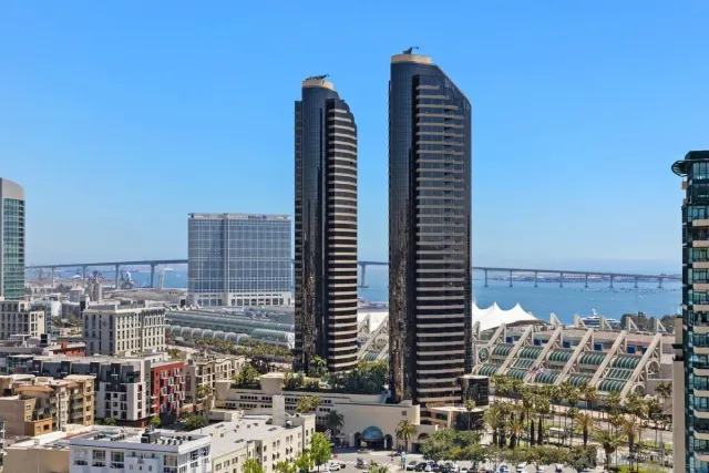 a view of city with tall buildings