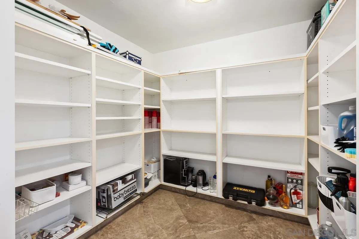 645 Front Street, Unit 2004 San Diego, CA 92101 - Photo 45 of 47 a view of an empty room with empty shelves