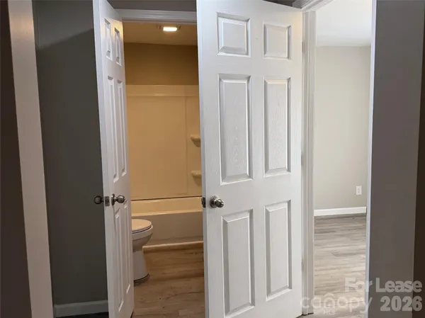 a kitchen with a sink cabinets and a refrigerator