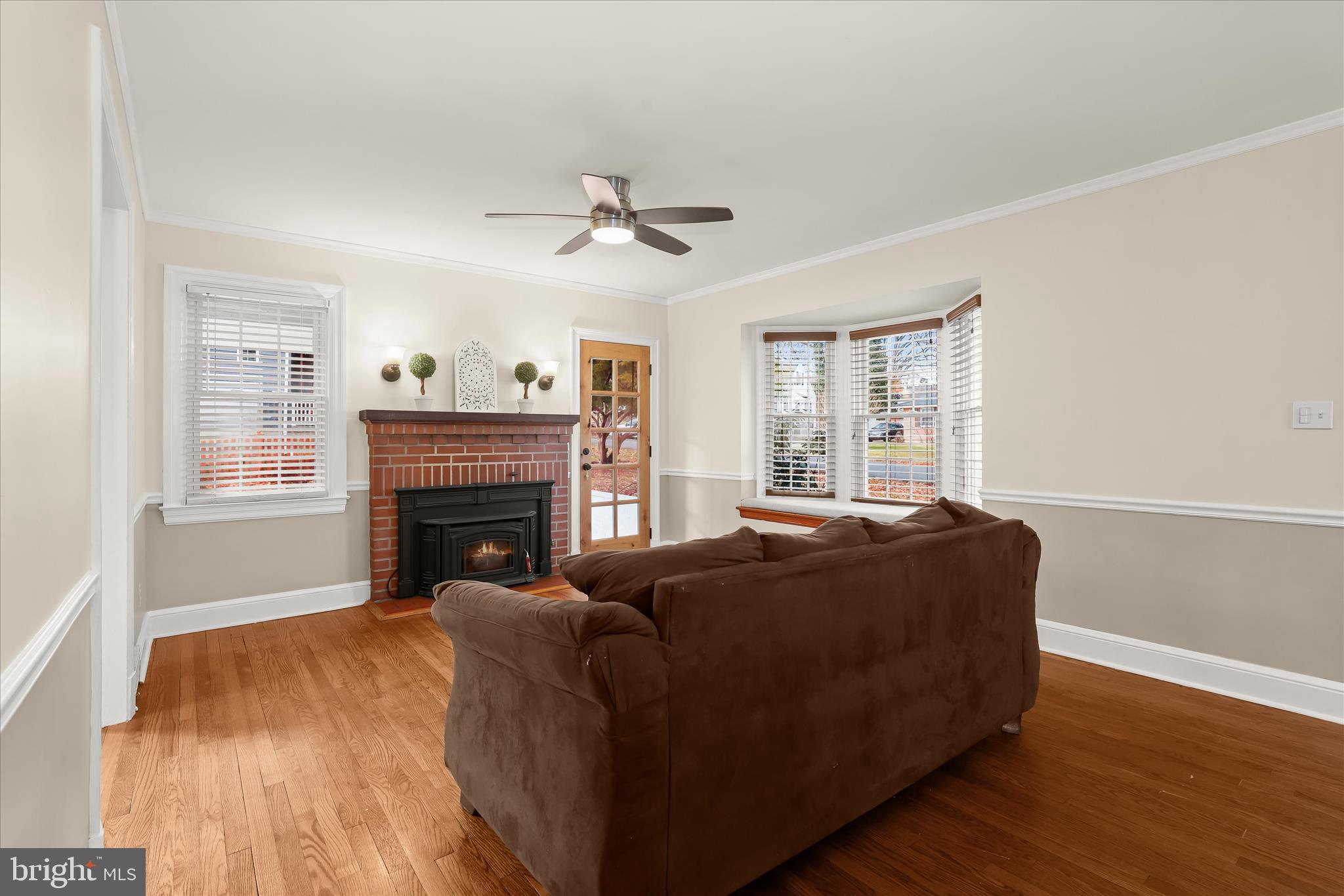 3603 Landbeck Road Baltimore, MD 21207 - Photo 4 of 62 Living Room - Hardwood Floors - Fireplace