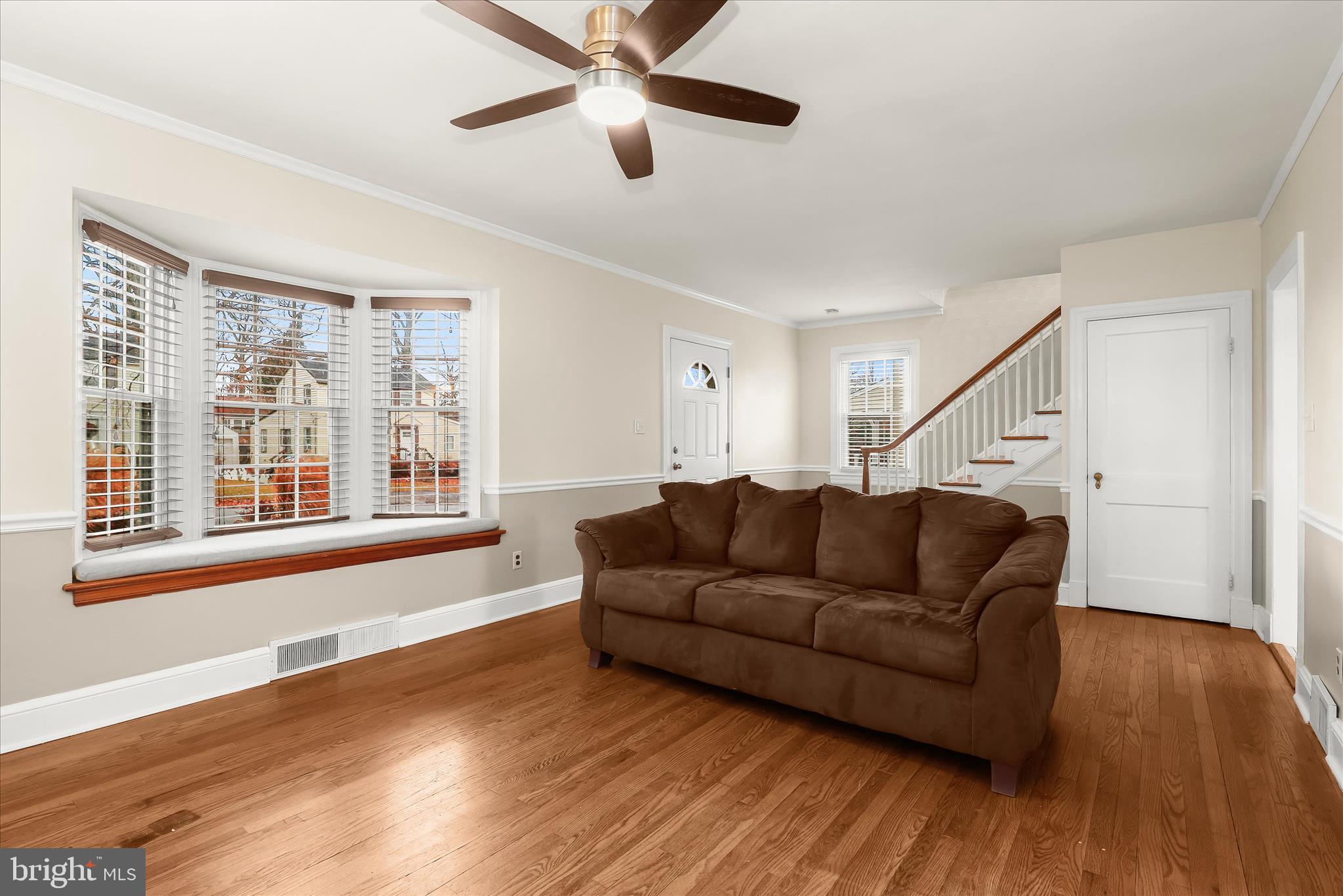 3603 Landbeck Road Baltimore, MD 21207 - Photo 9 of 62 Living Room - Bay Window - Hardwood Floors