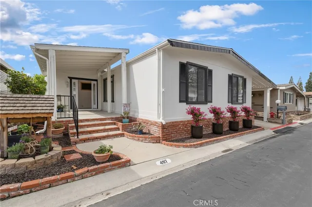 a front view of a house with garage