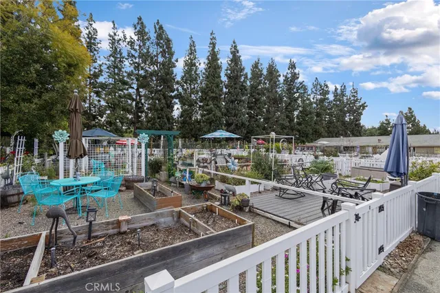 a view of a chairs and tables in the balcony