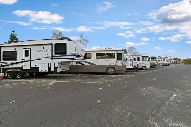 a view of a city street with cars