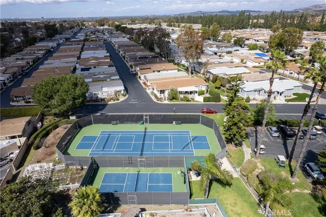 an aerial view of a house with a garden