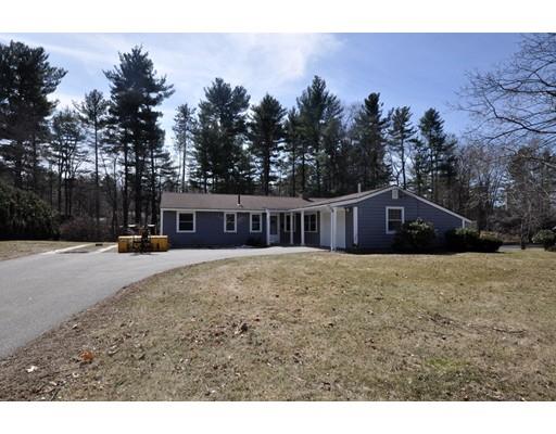 16 Judith Road Chelmsford, MA 01824 - Photo 12 of 14 a front view of a house with a yard and tree s