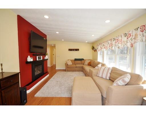 16 Judith Road Chelmsford, MA 01824 - Photo 6 of 14 a living room with furniture and a flat screen tv