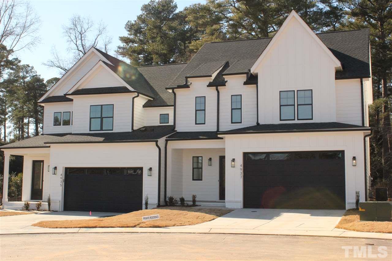 4933 Trek Lane Raleigh, NC 27606 - Photo 2 of 3 a house with a outdoor space