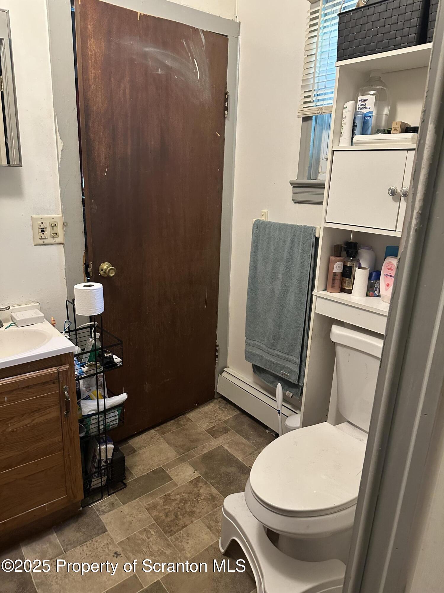 3061-3065 Main Street Clarks Summit, PA 18411 - Photo 19 of 34 a bathroom with a toilet and a shower