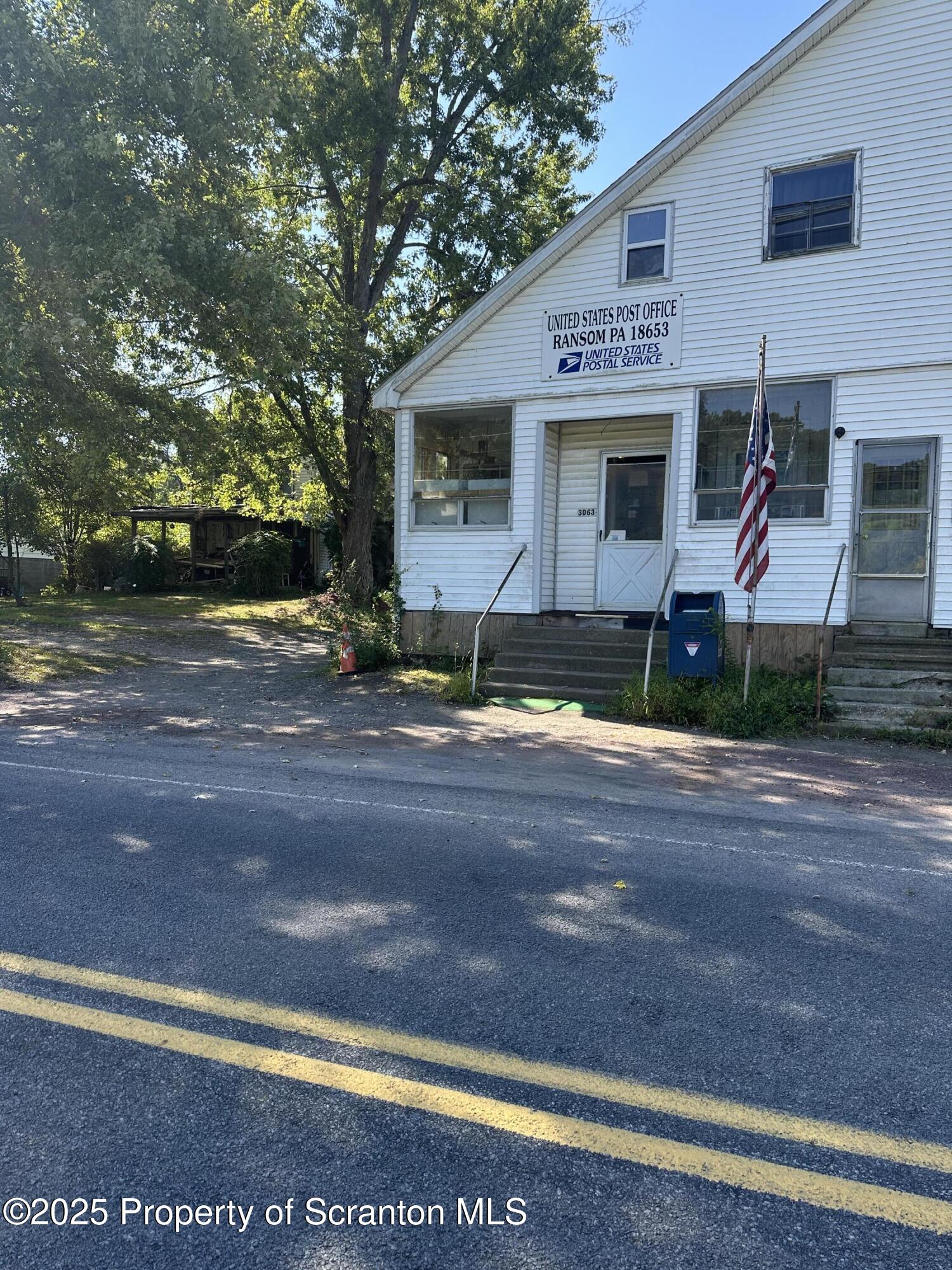 3061-3065 Main Street Clarks Summit, PA 18411 - Photo 2 of 34 a view of a house with a yard