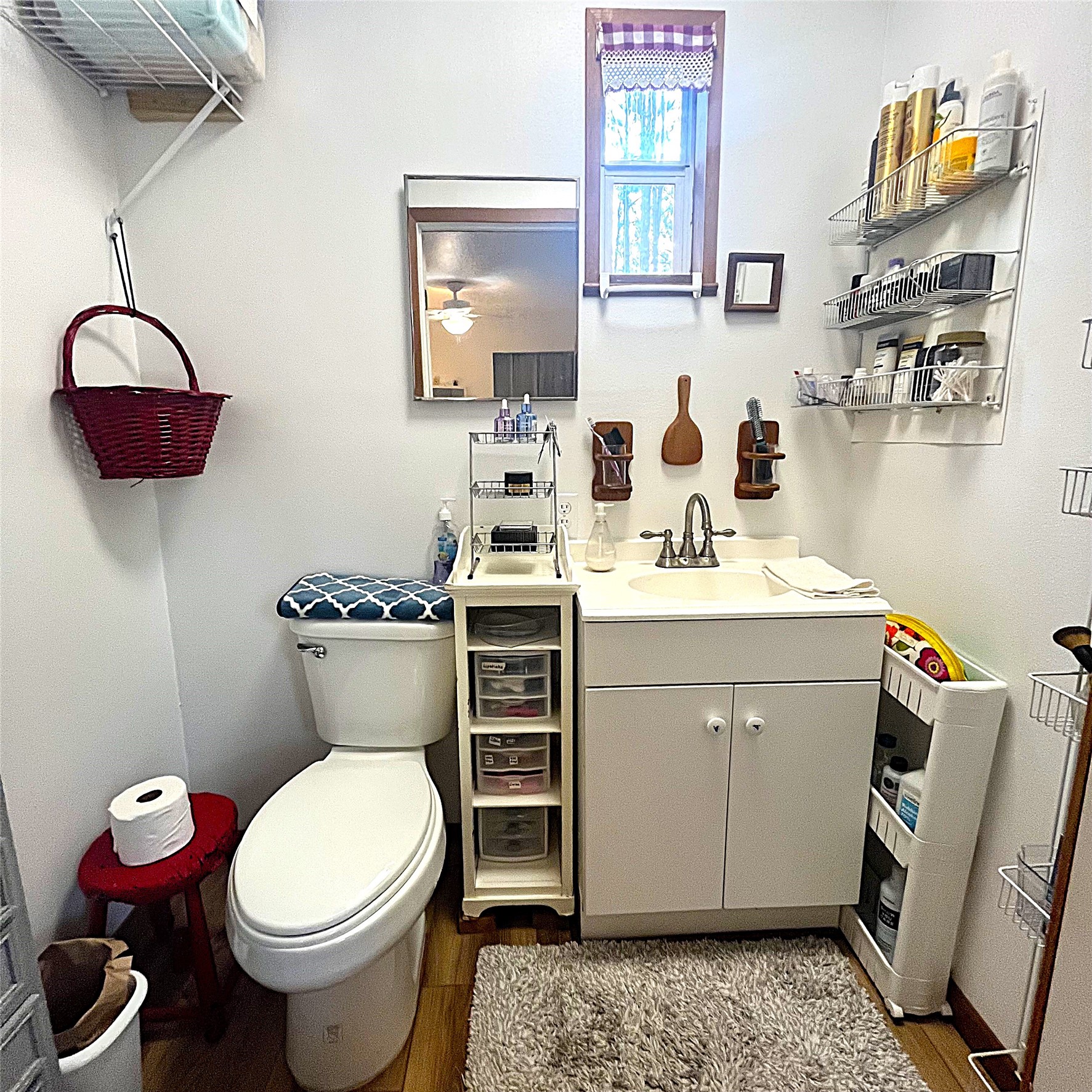 5002 Fm 811 Centerville, TX 75833 - Photo 11 of 31 a bathroom with a sink mirror vanity and toilet